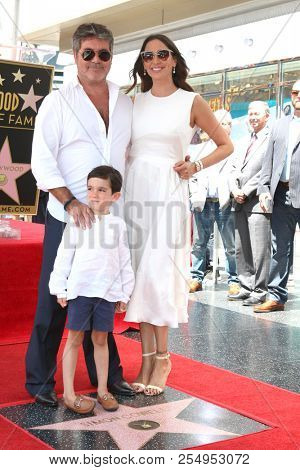 LOS ANGELES - AUG 22:  Simon Cowell, Eric Cowell, Lauren Silverman at the Simon Cowell Star Ceremony on the Hollywood Walk of Fame on August 22, 2018 in Los Angeles, CA