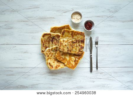 Cooking Traditional Pies With Potatoes. Placinta, Traditional Moldovan Pastries.