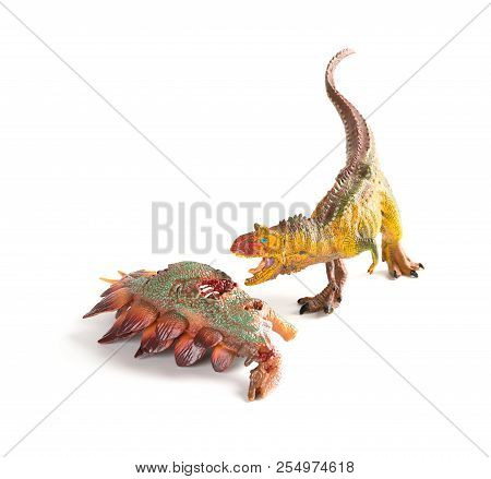 Carnotaurus With A Stegosaurus Body Nearby On White Background
