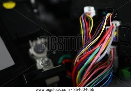 Close-up View Of Large Wide Cable With Multicolored Wires And Connectors. Electric Connector Plug Of