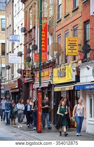 London, Uk - July 13, 2019: People Visit Brick Lane Street In Shoreditch District Of London. Shoredi