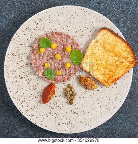 Beef Tartare With Mushroom Caviar And Red Pepper Mousse. The View From The Top