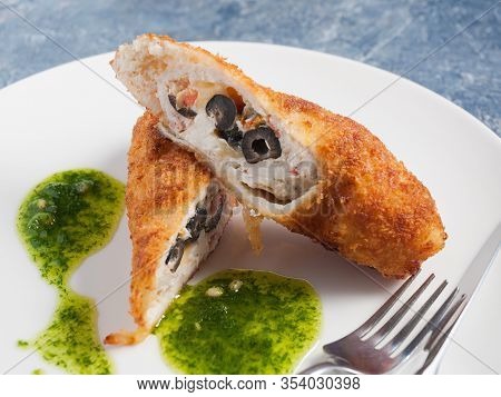 Chicken Zraza Stuffed With Tomatoes, Cheese And Olives. Close Up