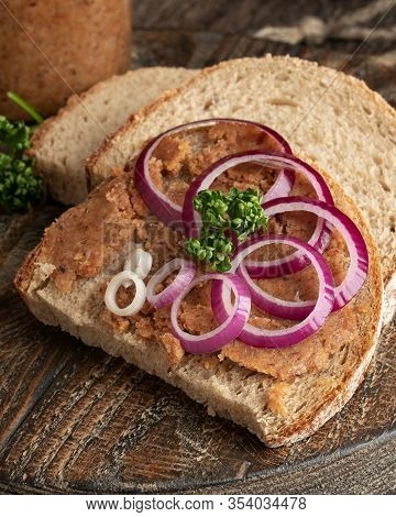 Bread Slathered With Pork Lard Mixed With Ground Cracklings, With Purple Onion And Parsley