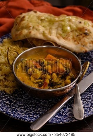 Mangalorean Style Roasted Cauliflower And Spinach Curry With Basmati Rice And Garlic Naan Bread, Tas