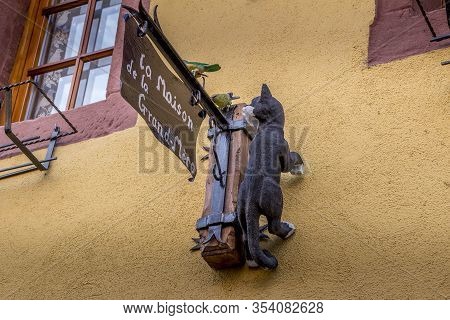 Beautiful View Of Charming Street Scene With Colorful Houses In The Historic Town Of Eguisheim On An