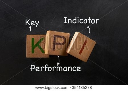 Hand drawn Key Performance Indicator (kpi) concept, business strategy on blackboard..