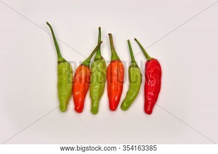 Red And Green Chili Peppers Studio Shot White Background