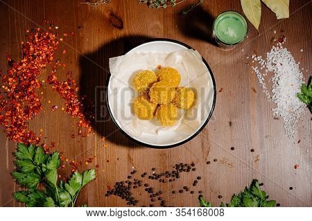 Potato Croquette Balls With Sauce On A Plate.top View