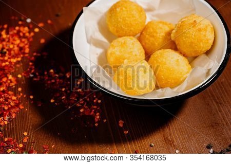 Potato Croquette Balls With Sauce On A Plate.