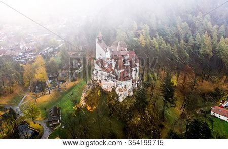 View from above on famous Bran Castle in the rain