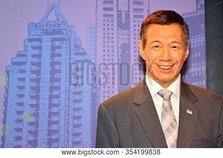 Bangkok, Th - Dec 13: Prime Minister Of Singapore Lee Hsien Loong Wax Figure At Madame Tussauds On D