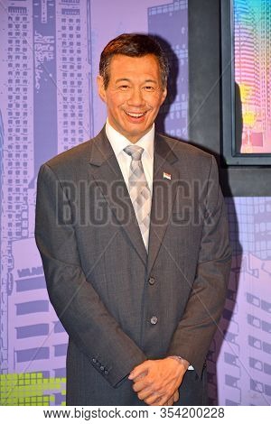Bangkok, Th - Dec 13: Prime Minister Of Singapore Lee Hsien Loong Wax Figure At Madame Tussauds On D