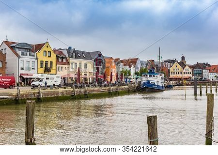 Husum, Germany - June 27, 2019: Coloful Houses At The Old Harbor In Husum, Germany