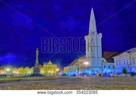 Kadan, Czech Republic - March 02, 2020: Empty Nighty  Mirove Namesti Square With Tower And Column