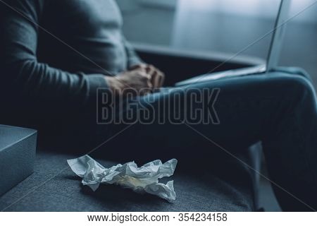 Selective Focus Of Crumpled Napkin Near Man Masturbating While Watching Pornography On Laptop On Cou