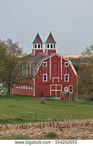 Granddaddy Of All Barns Proudly Showing Off Its Colors At Sundown