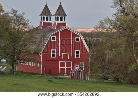 Granddaddy Of All Barns Proudly Showing Off Its Colors At Sundown
