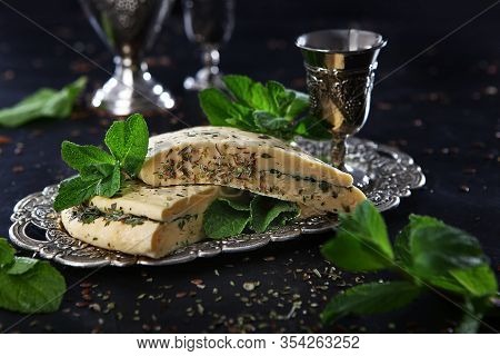 Halumi Cheese With Mint On A Vintage Tray With Vintage Silver-plated Accessories. Photo On A Black B