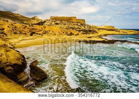 Castle San Ramon Above Beach Of El Playazo, Cabo De Gata Nijar, Province Almer