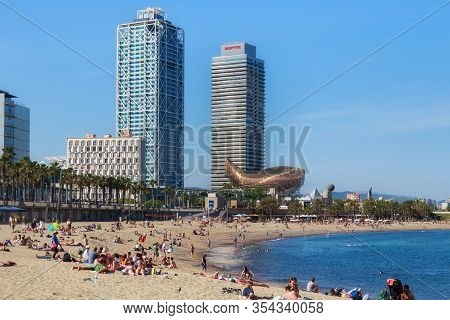 Barcelona, Spain - May 15, 2017: Unknown People Resting And Sunbathing On A City Beach In Barcelona 
