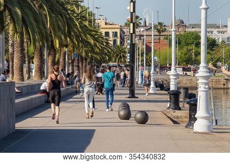 Barcelona, Spain - May 16, 2017: Unknown People On The Moll De Bosch I Alsina Street In Port Vell In