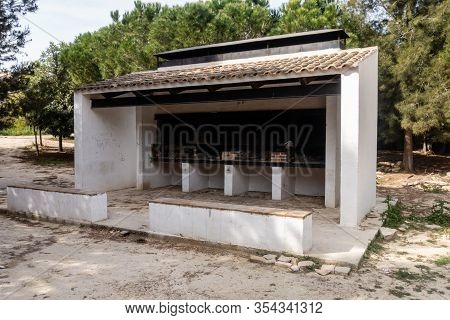 Public Barbeque Area In A Park Near Torremendo In Spain