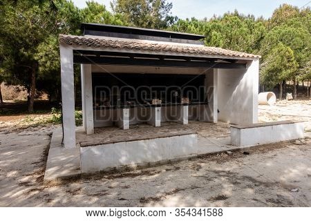 Public Barbeque Area In A Park Near Torremendo In Spain