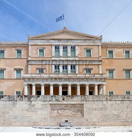 Greek Parliament Building On Syntagma Square And The Tomb Of The Unknown Soldier Which Is Located On