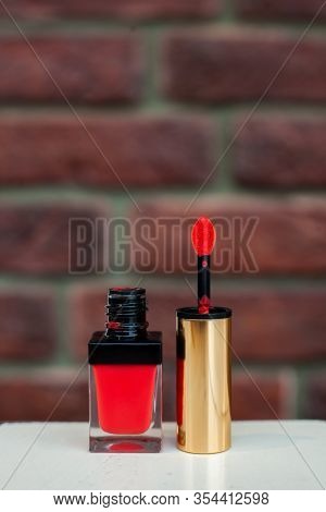 Opened Coral Multi-functional Tint For Everyday Makeup On White Wooden Background. Especially For Ch