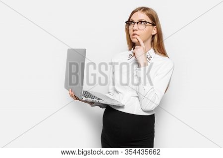 Image Of Young Pregnant Businesswoman In Glasses Pensive Girl Posing With Laptop