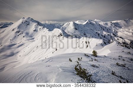 Snowy peaks, Planneralm skiing resort in winter,  Austrian Alps