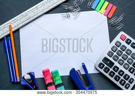 Stationery Is Placed Around A White A4 Sheet Of Paper .
