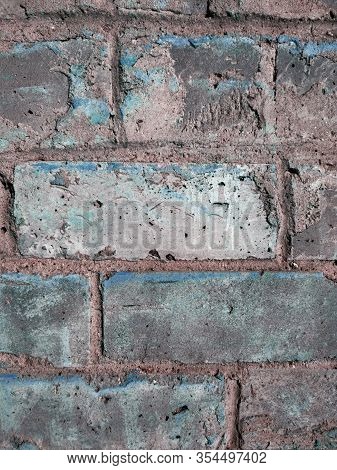 Large Concrete Gray Brick With Blue Paint. Stone Texture For Poster, Grunge Design, Construction Adv