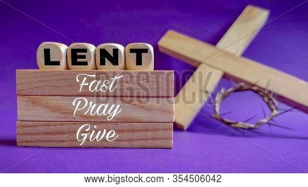 Text Lent Fast Pray Give On Wooden Block