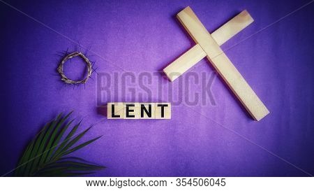 Lent Season,holy Week And Good Friday Concepts - Word Lent On Wooden Blocks In Purple Vintage Backgr