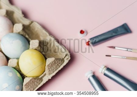 The Concept Of Coloring Easter Eggs In Pastel Watercolor Colors. Paints And Brushes For Coloring Egg