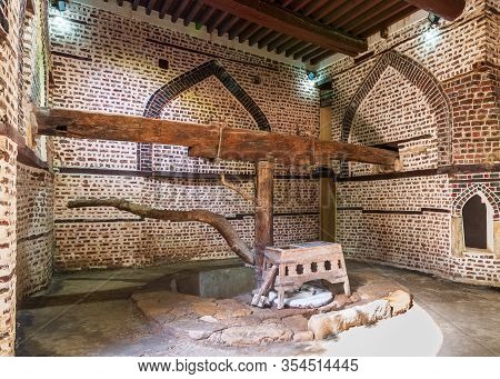 Cairo, Egypt - February 1 2020: Ancient Rotary Flour Mill Used To Be Rotated By Animal Power, Known 