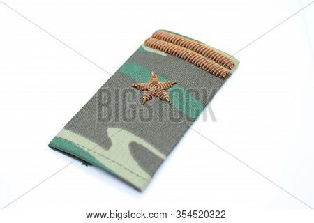 The Camouflaged Pagon Of The Russian Army's Major Located On A White Background