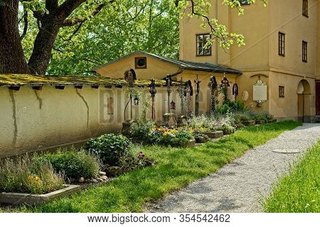 A Picturesque Row Of Old Graves In The Courtyard Of The Nonnberg Abbey In Salzburg, Austria