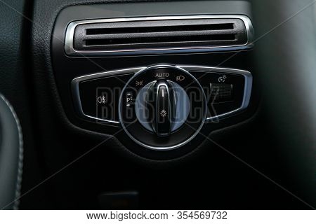 Novosibirsk, Russia - March 06, 2020:  Mercedes-benz  C-class,  Close-up On The Headlight Switch Con