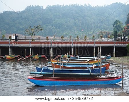 Tabanan Bali, Indonesia - August 24, 2019: Kanoo Boats For Rent At Beratan Lake In Bedugul Bali