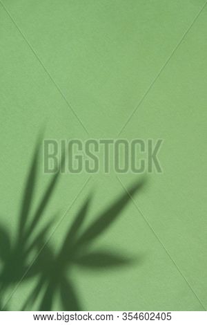 Cannabis Leaf Made Of Paper On Green Background