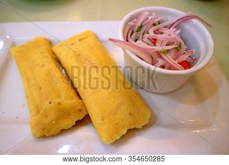 Plate Of Humitas Or Steamed Fresh Corn Cakes, A Popular Traditional Food Of The Andes Region