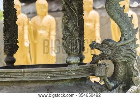 Foz Do Iguacu, Parana / Brazil; Dec 17, 2017: Chen Tien Buddhist Temple Detail, Sculpted Metallic Dr