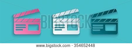 Paper Cut Movie Clapper Icon Isolated On Blue Background. Film Clapper Board. Clapperboard Sign. Cin