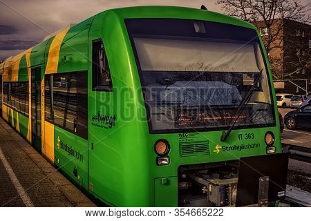 Korntal,germany - March 08,2020:train Station This Is A Modern Train Of The Strohgaeubahn,which Runs