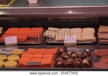 Various Sorts Of Raw Snacks On Display In A Fast Food Restaurant