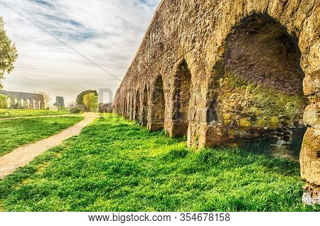 Ruins Of The Iconic Parco Degli Acquedotti, Rome, Italy. The Public Park Is Named After The 7 Ancien