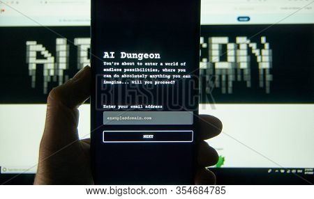 Montreal, Canada - March 08, 2020: Ai Dungeon Adventure Text Game On A Cell Phone Over Laptop Screen